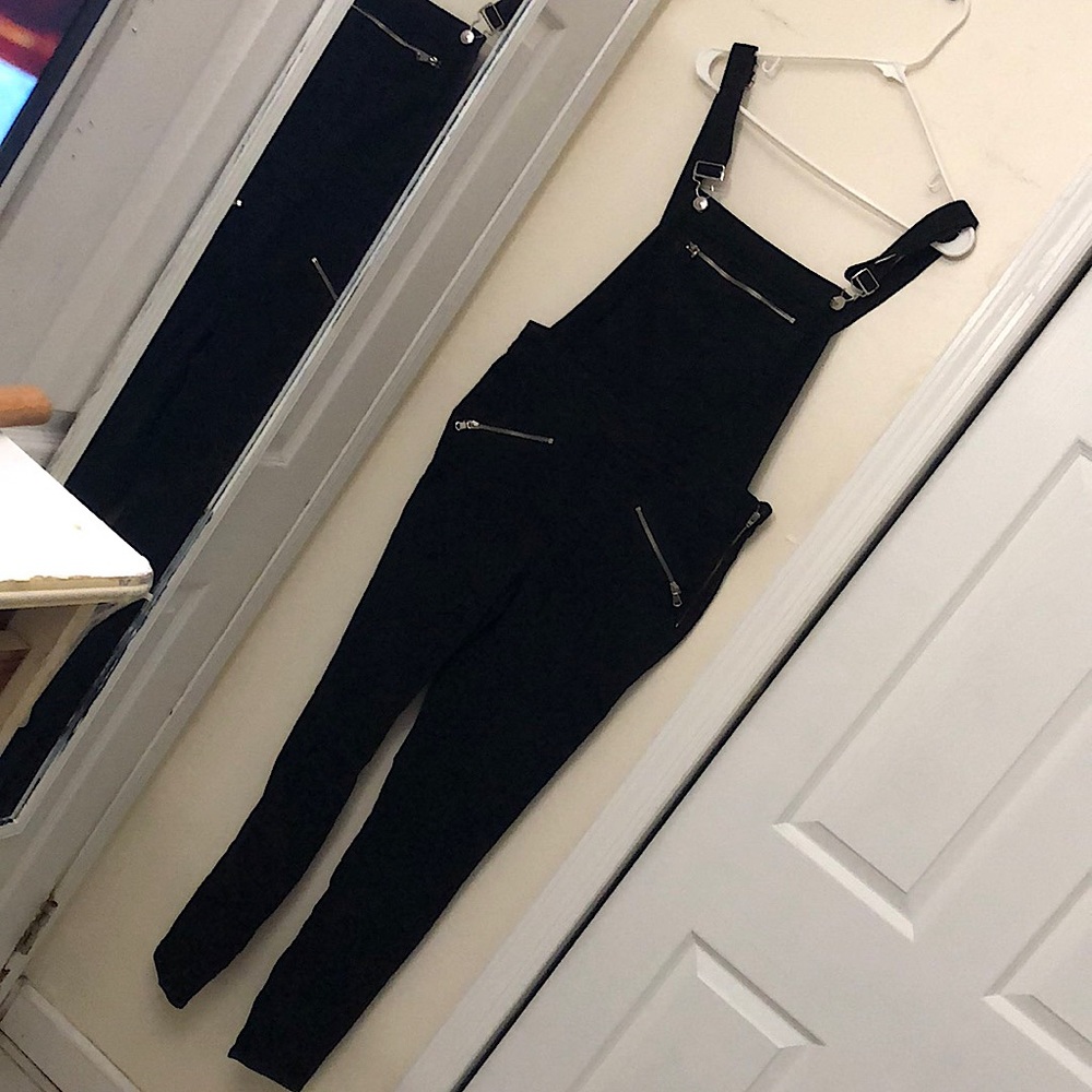 Divide  H&M black h&m overalls. Skinny jeans.